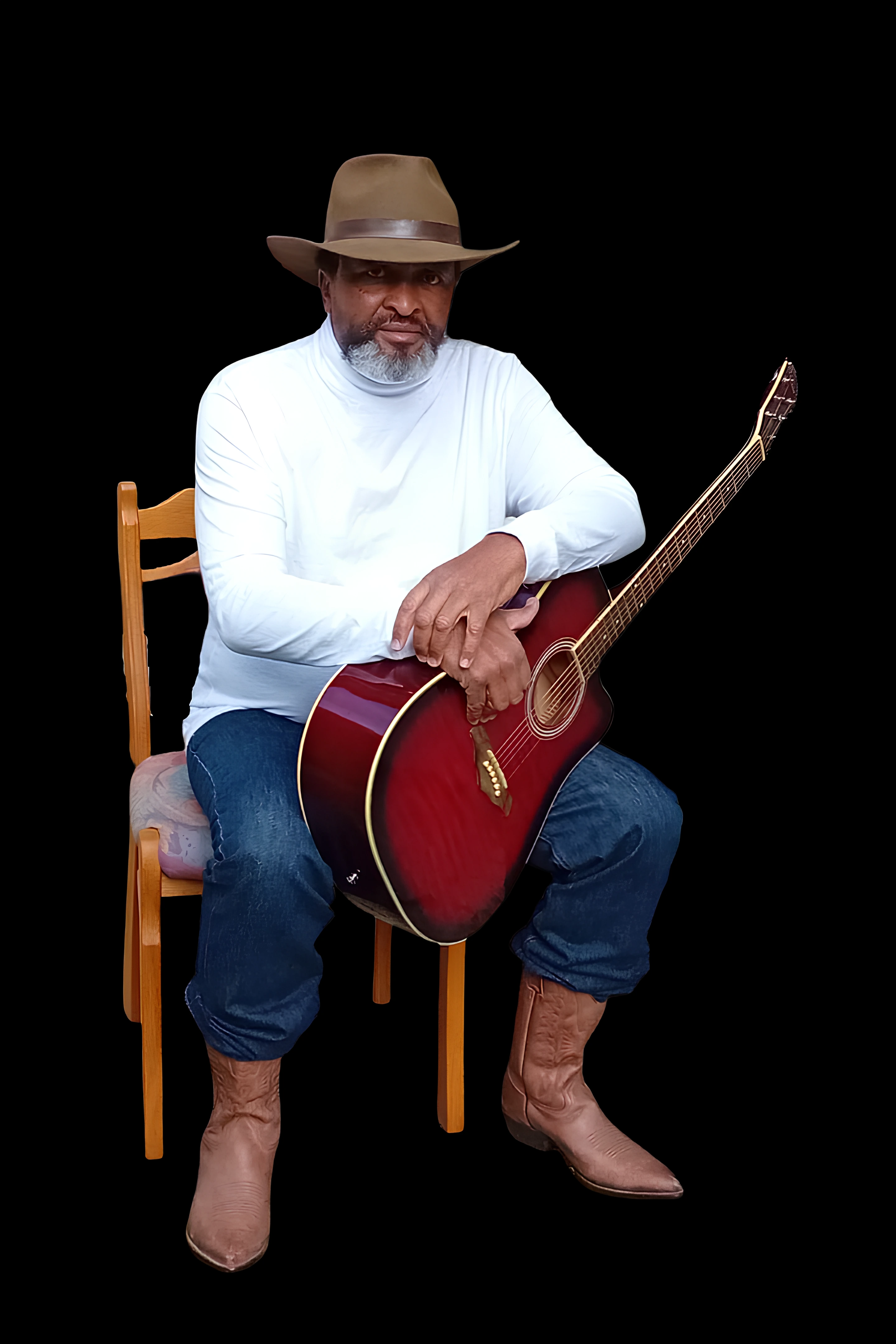 Portrait of Sir Charles sitting with a guitar